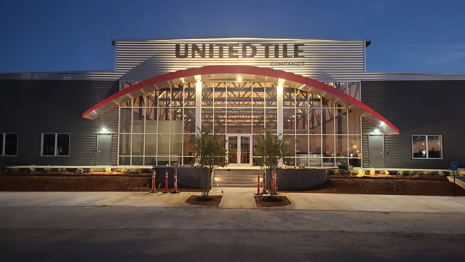 Finished: the new entrance lit up at dusk.