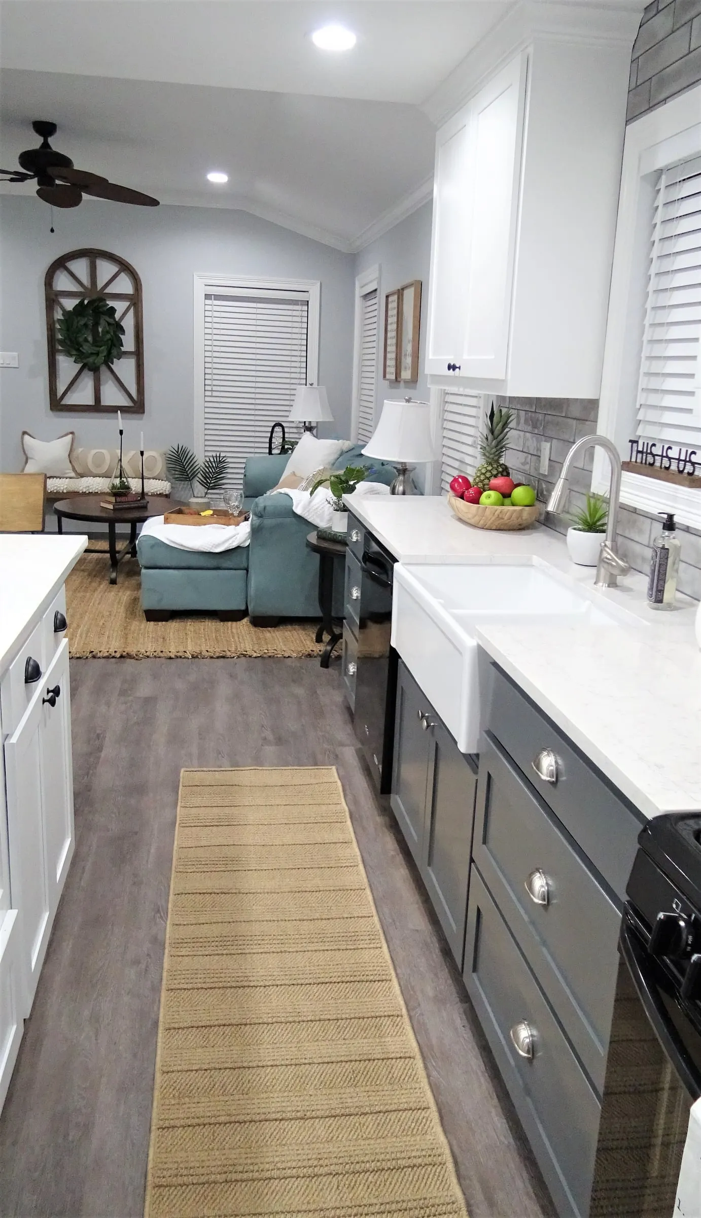 View down the galley kitchen toward the living room.
